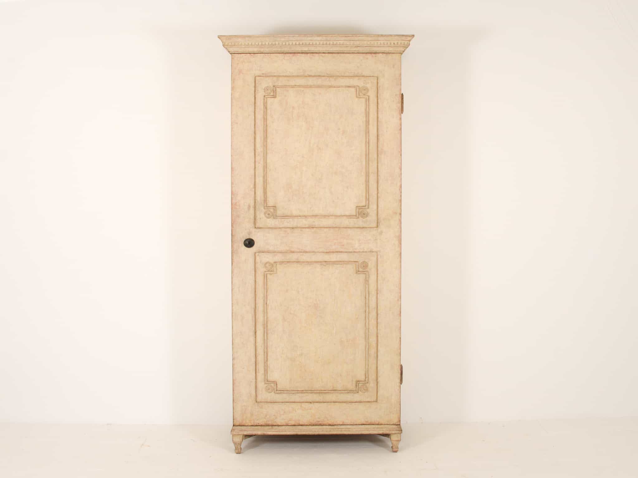 19th century Gustavian cupboard in pale paint