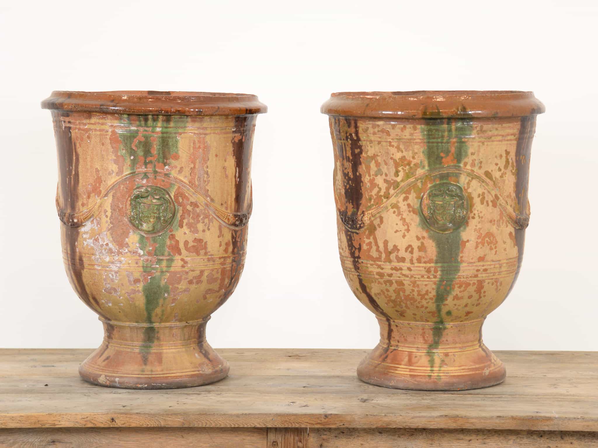 A pair of glazed Anduze planters