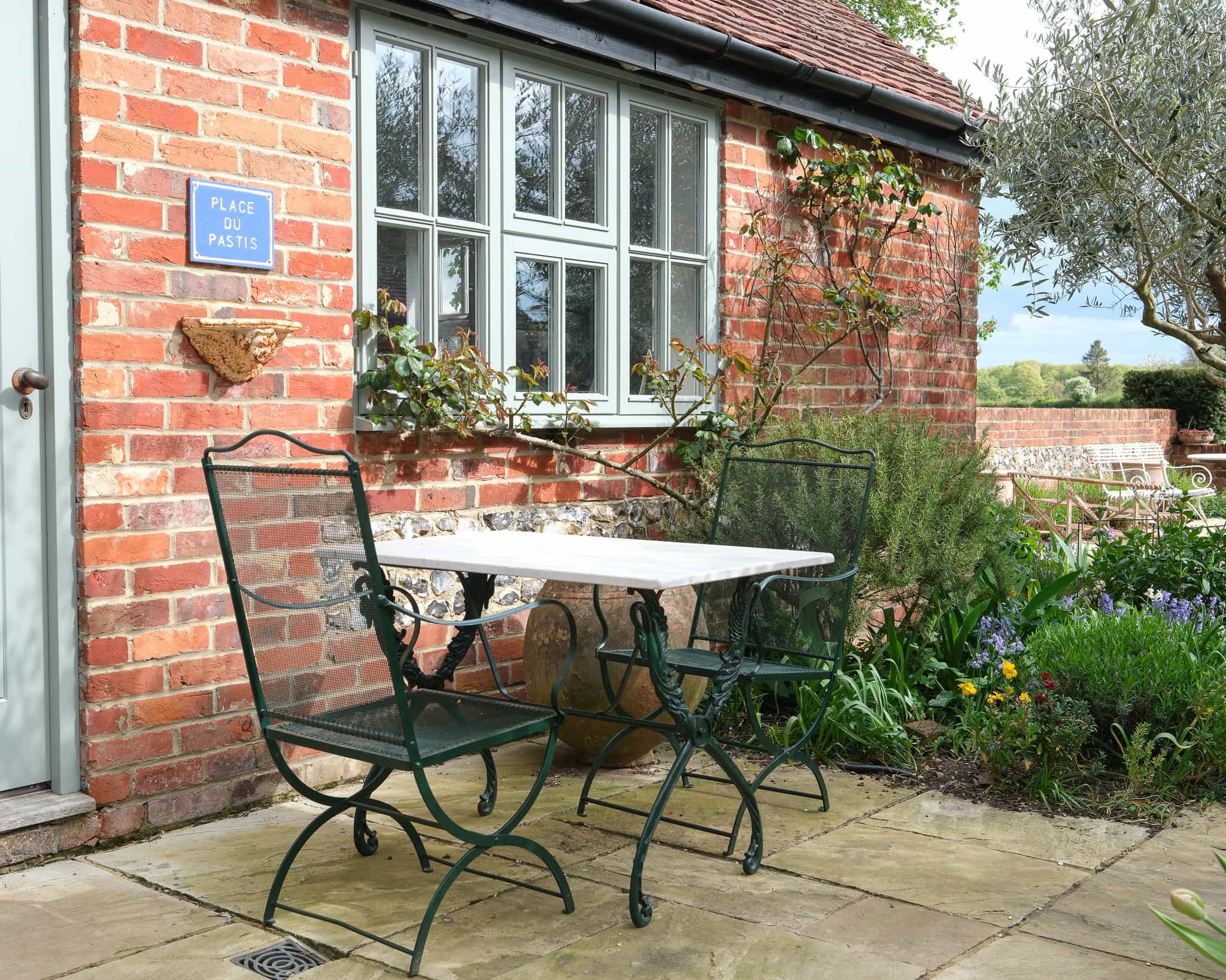 French iron garden table and chairs