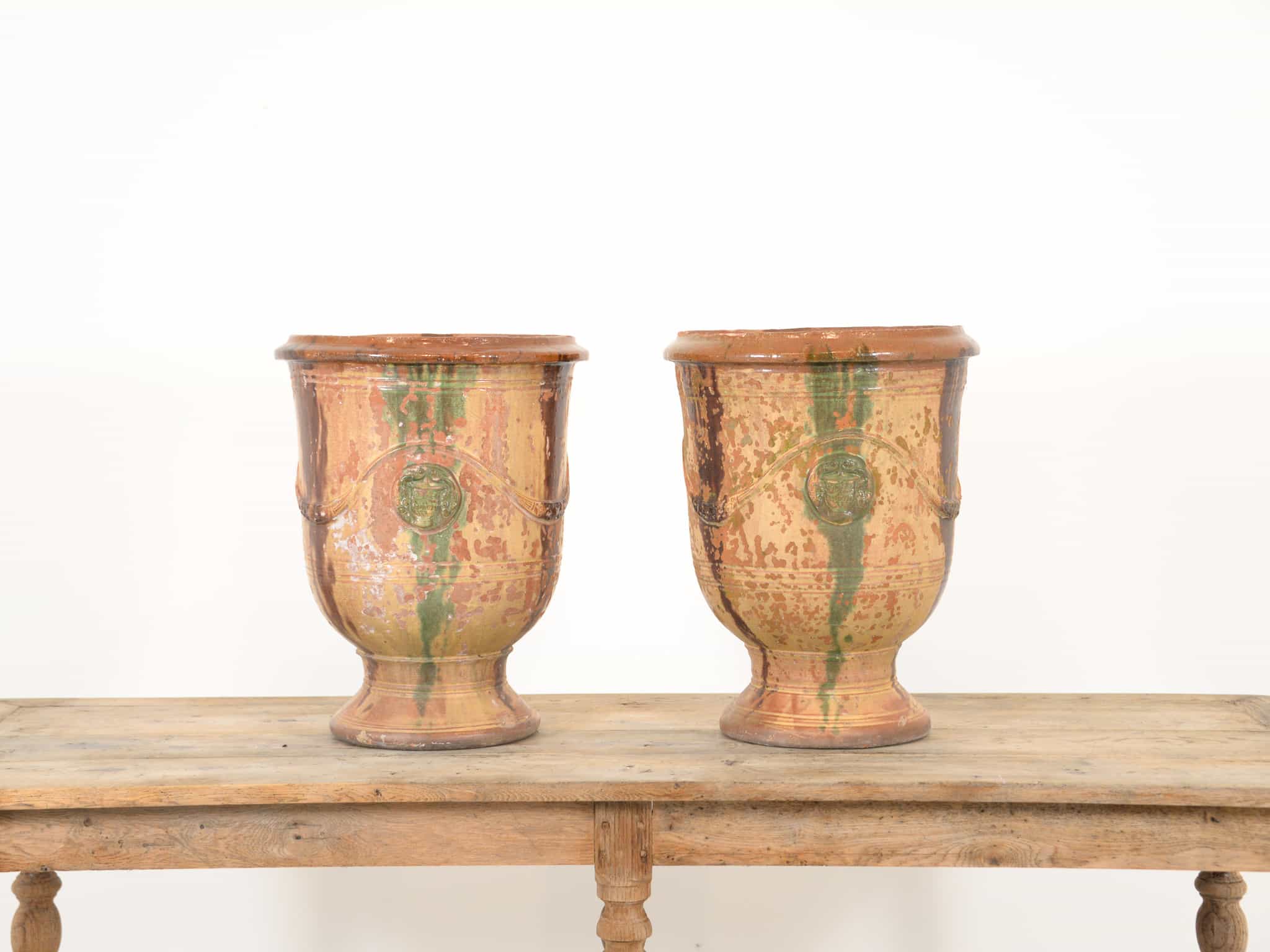 A pair of glazed Anduze planters