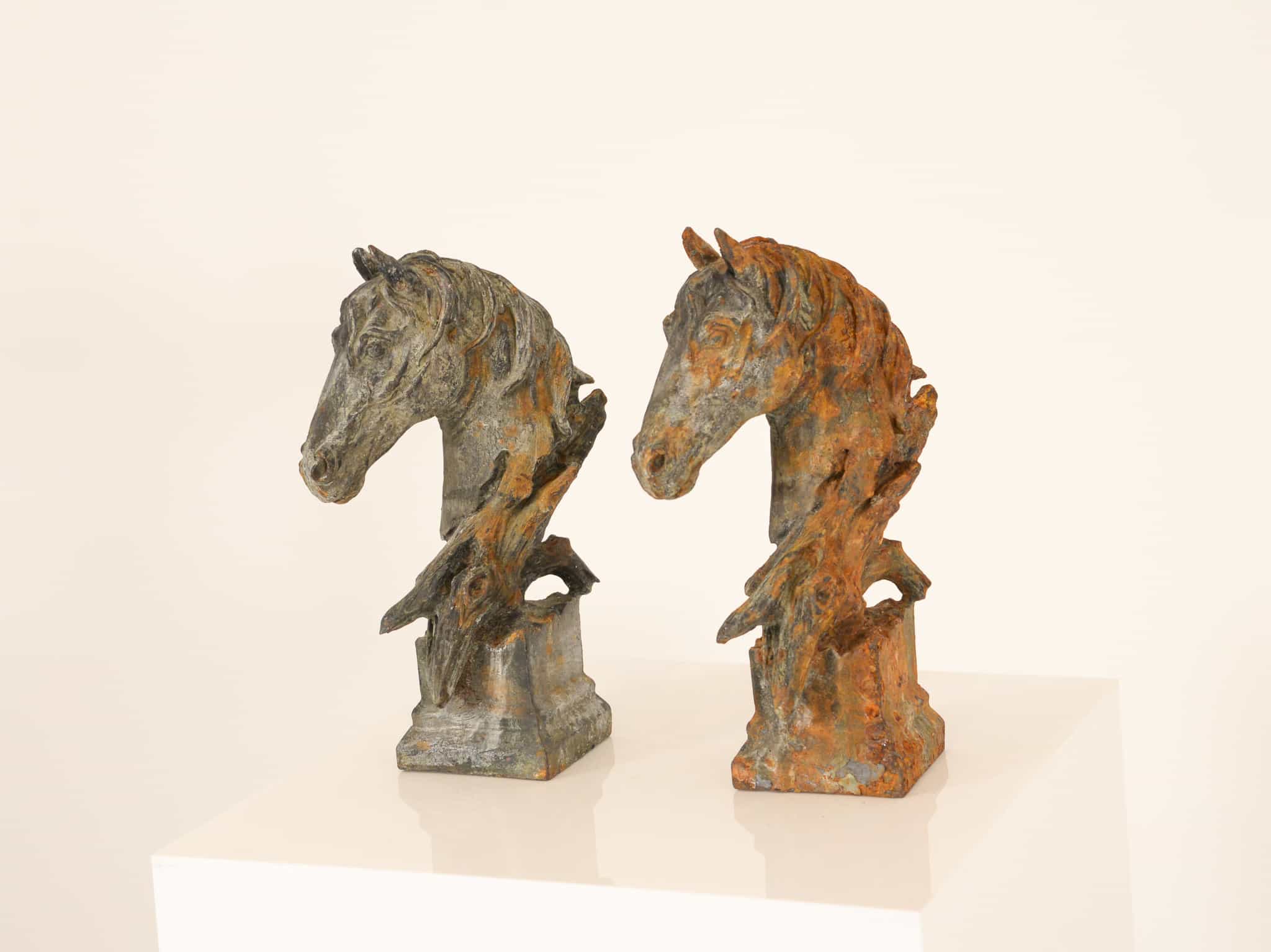 Pair of cast iron horse heads