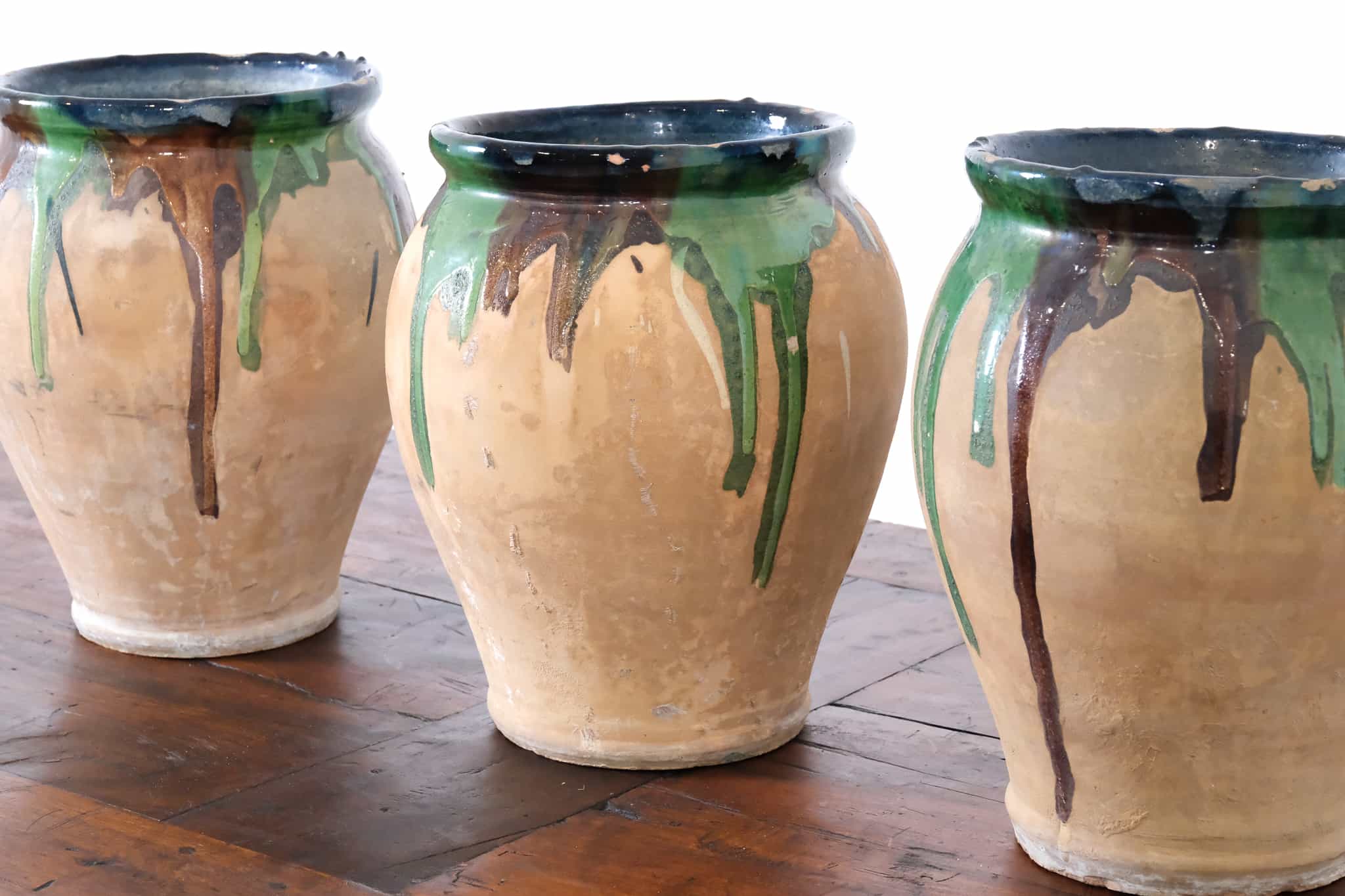 Three glazed ceramic pots
