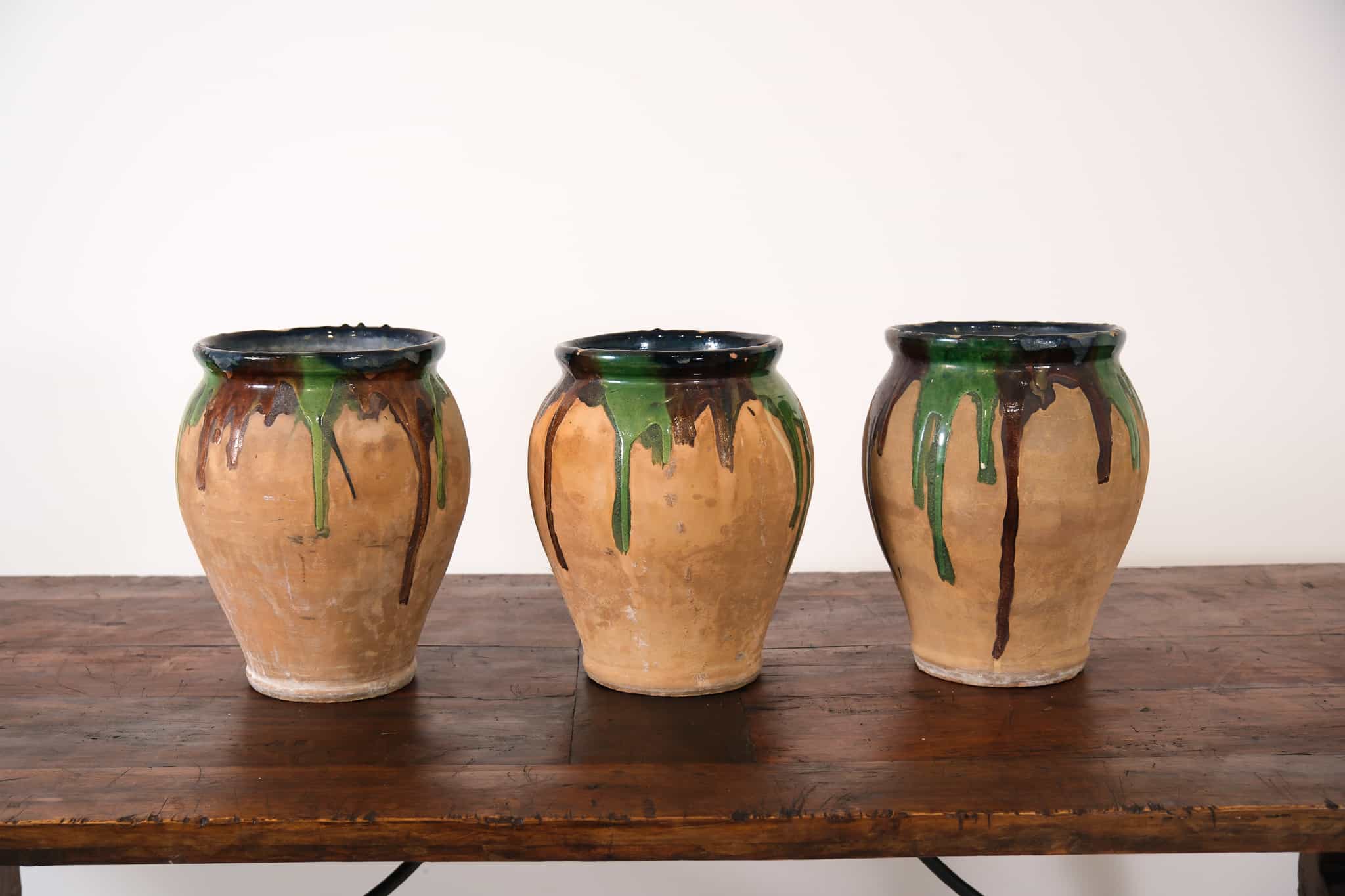 Three glazed ceramic pots